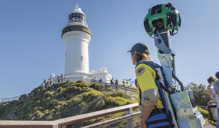 NSW National Parks ranger exploring Cape Byron Lighthouse with the Google Street View trekker. Photo John Spencer