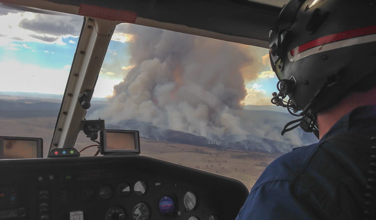 Monitoring a bushfire from a helicopter. Photo: Sean Perry