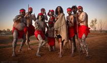 A group of Aboriginal dancers wearing red attire at the Mutawintji Cultural Festival. Credit: Andrew Hull &copy; Andrew Hull