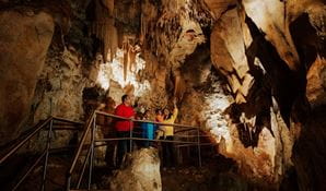 Visitors check out impressive cave formations in Wollondilly Cave at Wombeyan Karst Conservation Reserve. Credit: Remy Brand &copy; DPE 