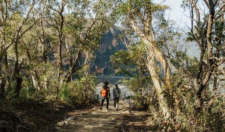2 walkers approaching Gordon Falls lookout, Greater Blue Mountains Heritage Area. Photo: Remy Brand &copy; Remy Brand