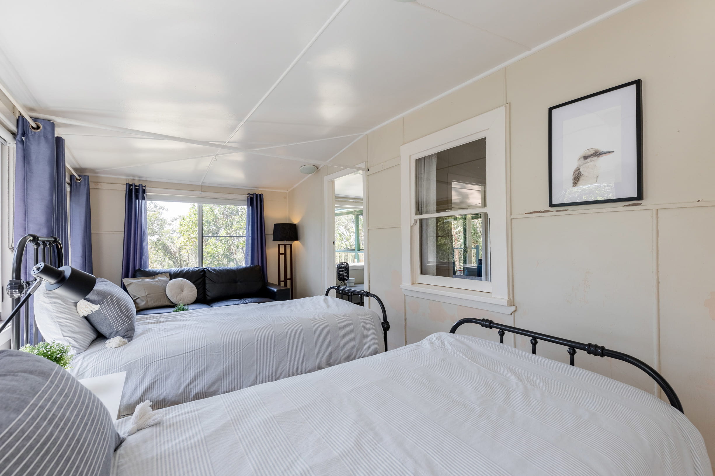 The second bedroom with single beds in Tuckers Rocks Cottage, Bongil Bongil National Park. Photo: Mitchell Franzi/DPIE