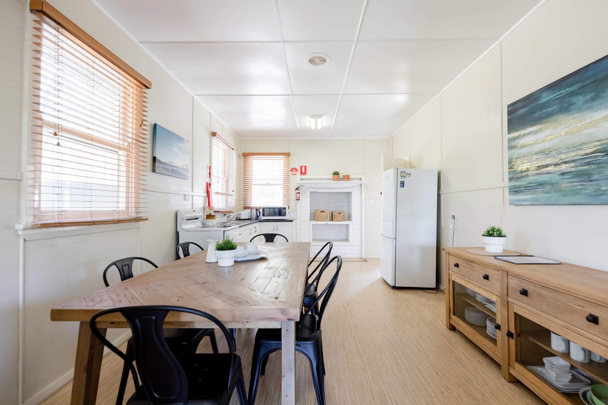 The kitchen and dining room at Tuckers Rocks Cottage in Bongil Bongil National Park. Photo: Mitchell Franzi/DPIE