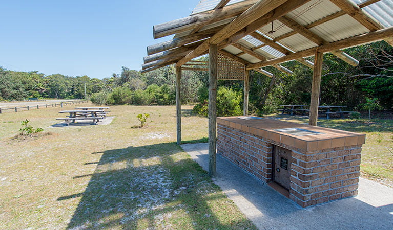 Shelter over barbecue facilities, Elizabeth Beach picnic area, Booti Booti National Park. Photo credit: John Spencer &copy; DPIE