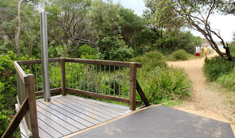 Outdoor shower area at Putty Beach campground in Bouddi National Park. Photo: John Yurasek/OEH