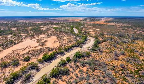 Aerial view of a tree-lined creek in Mulga shrublands in Brindingabba National Park, 175km from Bourke. Photo: Joshua Smith, &copy; DCCEEW