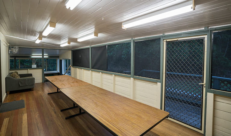 Enclosed dining area and verandah in Swamp House, Bundjalung National Park. Photo: J Spencer/OEH