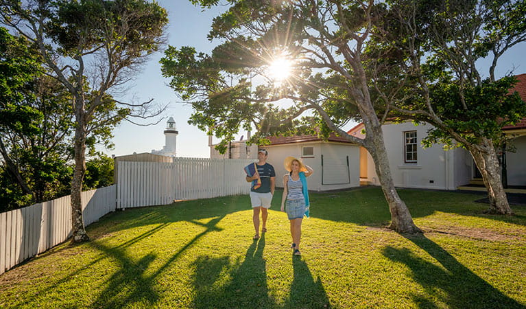 Couple heading off to the beach from the Assistant Lighthouse Keepers Cottage. John Spencer/DPIE