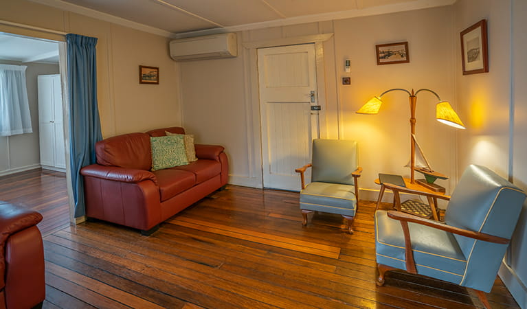 Retro-style lounge room in Partridge cottage. Photo: DPIE/John Spencer