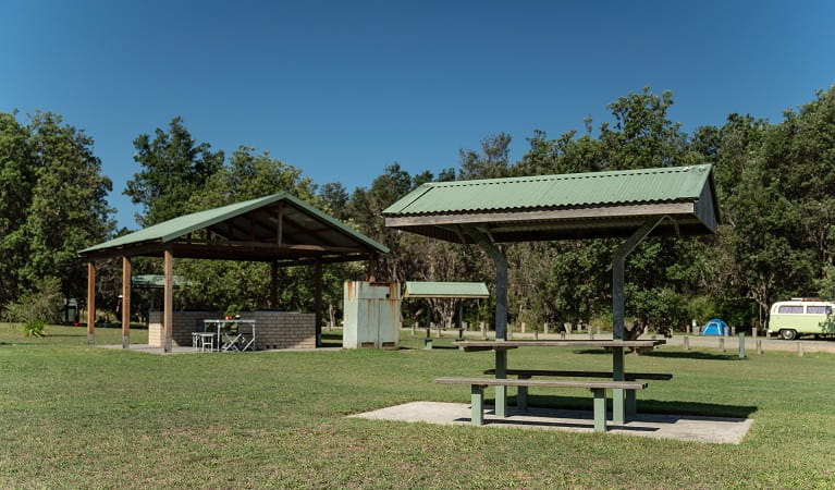 Picnic tables and barbecue facilities at Crowdy Gap campground, Crowdy Bay National Park. Photo: Rob Mulally/DPIE