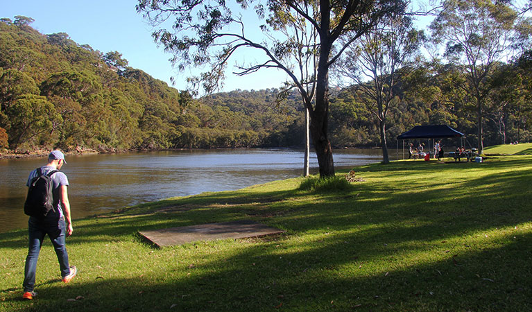 People by the river at Davidson picnic area in Garigal National Park. Photo: Natasha Webb