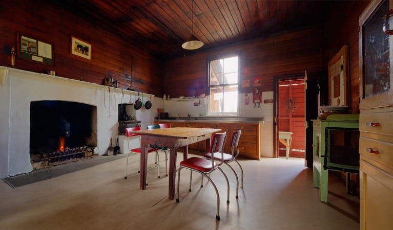 Kitchen and dining area in The Pines Cottage, Kosciuszko National Park. Photo: Murray Vanderveer/OEH