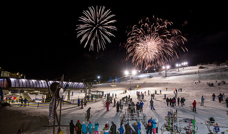 People watch a fireworks display on ski slopes at Perisher in Kosciuszko National Park. Photo: Images supplied courtesy of Perisher Ski Resort