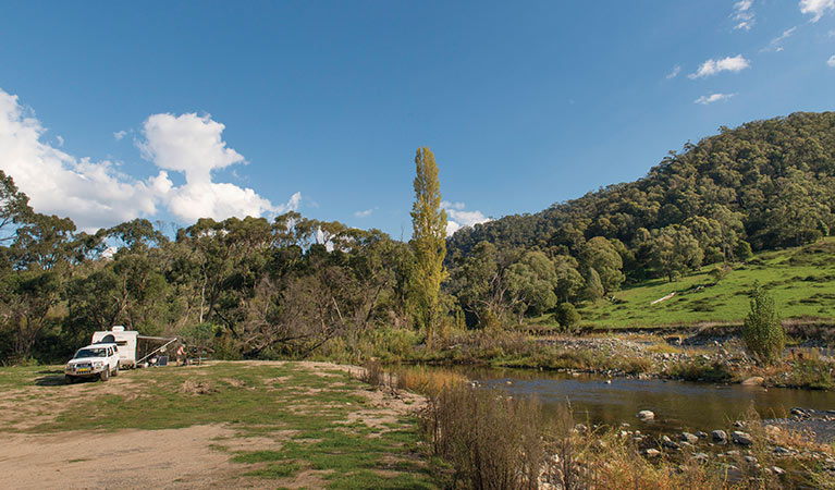 Car with caravan at Rock Flat campground, Kosciuszko National Park. Photo: John Spencer &copy; DPIE