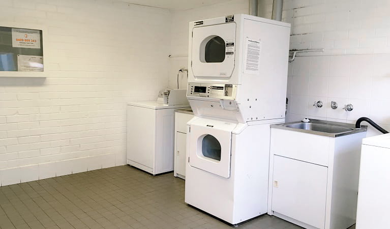 Washing machines and dryers in the laundry Lane Cove caravan park. Photo: Claire Franklin/OEH