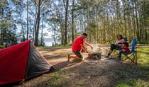 Campers cooking up a storm at Bungarie Bay campground. Photo: John Spencer/OEH