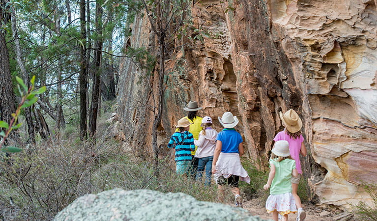 A group of people following a ranger on a tour of Pilliga National Park. Photo: John Spencer &copy; DPIE