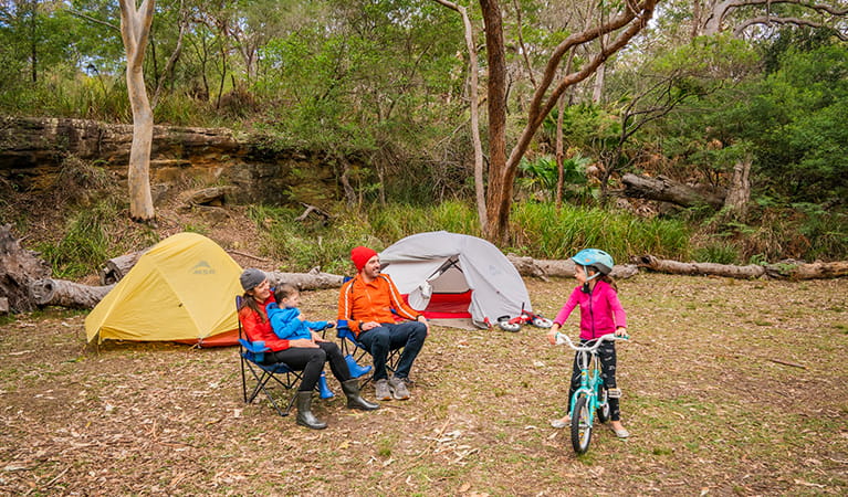 Family with young kids camping in Royal National Park. Photo: John Spencer/OEH