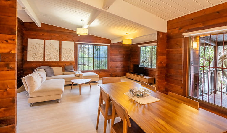 Open plan lounge and dining room at Weemalah Cottage, Royal National Park. Photo: John Spencer/OEH
