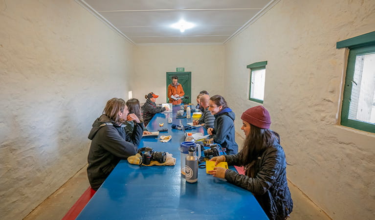 Group of students in the communal eating area, Mount Wood Shearers Quarters. Photo: John Spencer/DPIE