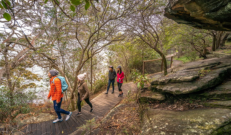 Friends walk along Hermitage Foreshore track, Sydney Harbour National Park. Photo: John Spencer &copy; OEH