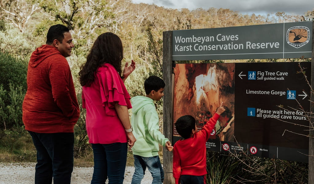 Visitors follow signs to Fig Tree Cave on a self-guided tour. Credit: Remy Brand/DPE &copy; Remy Brand