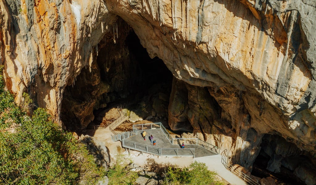 Aerial view of a family group about to enter Victoria Arch, the last chamber of Fig Tree Cave at Wombeyan Caves. Credit: Remy Brand/DPE &copy; Remy Brand