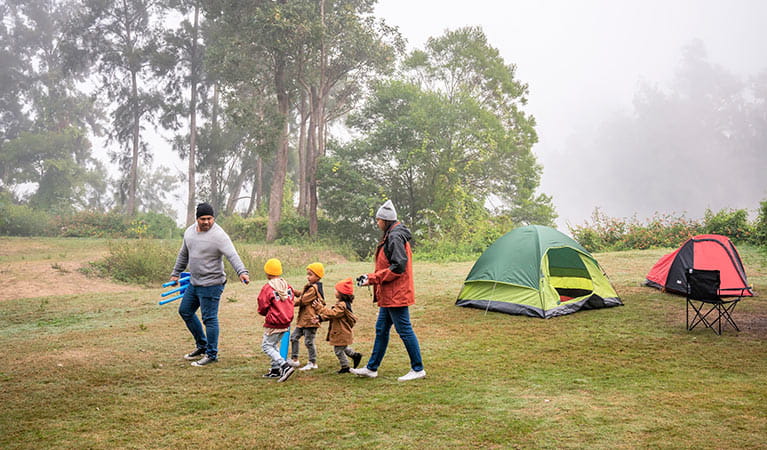 Family with young kids camping at Cattai campground. Photo: John Spencer/DPIE
