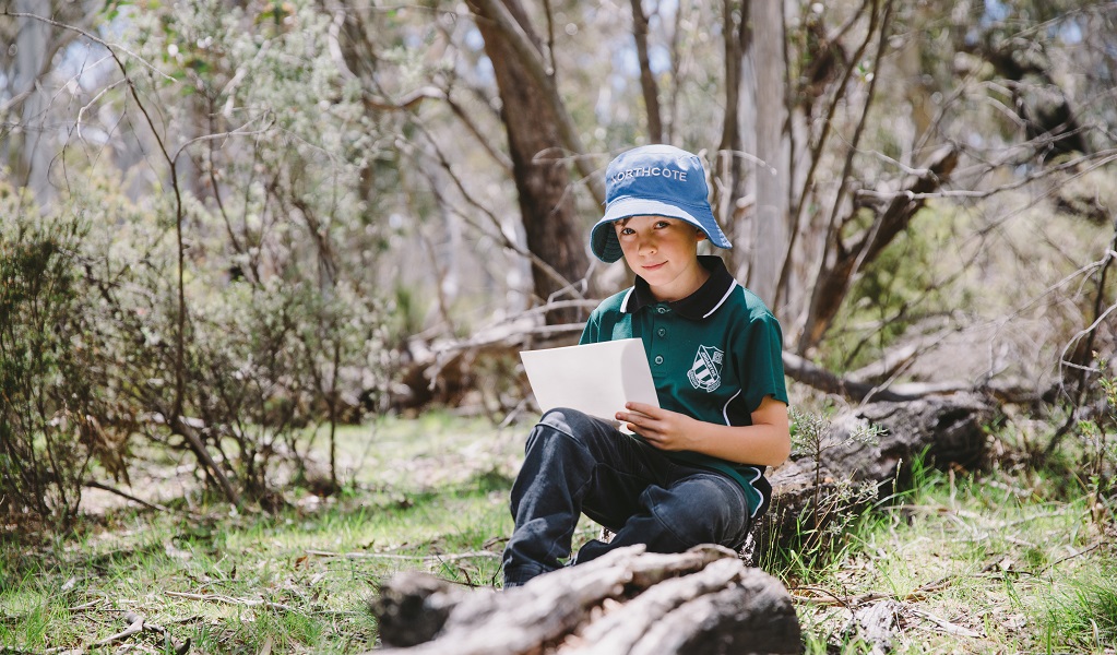 A student doing a field sketch, Kosciuszko National Park. Photo: Remy Brand &copy; DPE