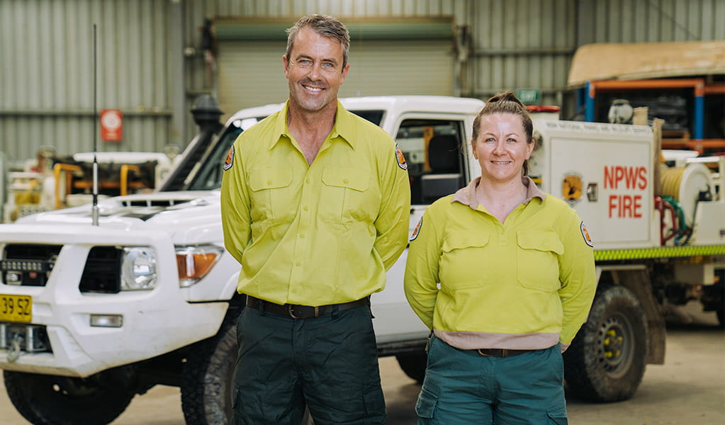 NPWS staff in front of a NPWS fire vehicle in a depot. Credit: Remy Brand &copy; DPE