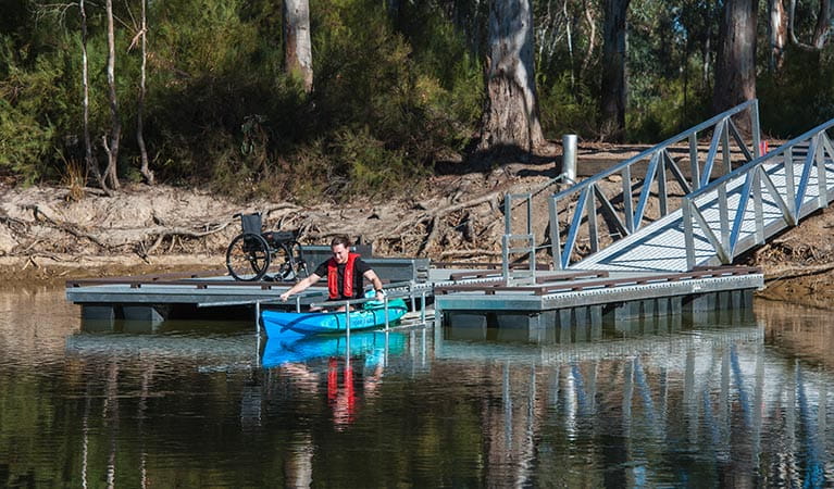 Kayaker launching off the wheelchair-accessible kayak ramp in Murray Valley Regional Park. Photo: Rhys Leslie/OEH