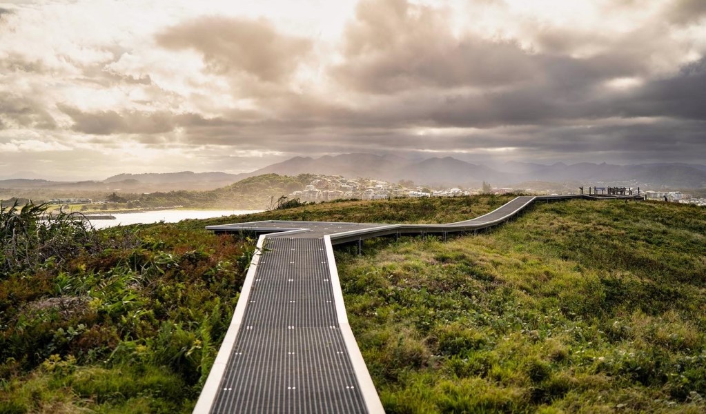The path across the island with the view to Coffs Harbour in the background. Photo © Joshua Woods