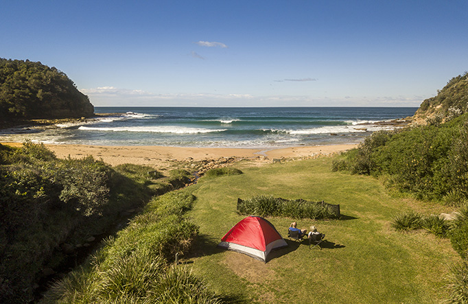 Aerial view of a tent at Little Beach campground in Bouddi National Park. Photo: John Spencer/DPIE