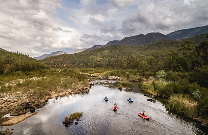 Aerial view of kayakers on Pinch River, Lower Snowy River area of Kosciuszko National Park.