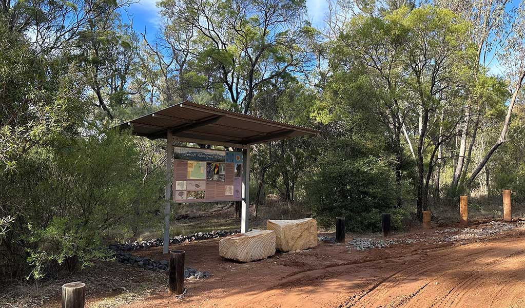 An interprative sign about Aboriginal culture at Deriah Aboriginal area, joint managed by NPWS and the local Aboriginal community. Credit: DCCEEW &copy; DCCEEW.