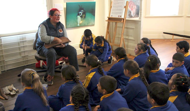 Students learning about Aboriginal culture and history with an Aboriginal guide. Photo: Kim Collas