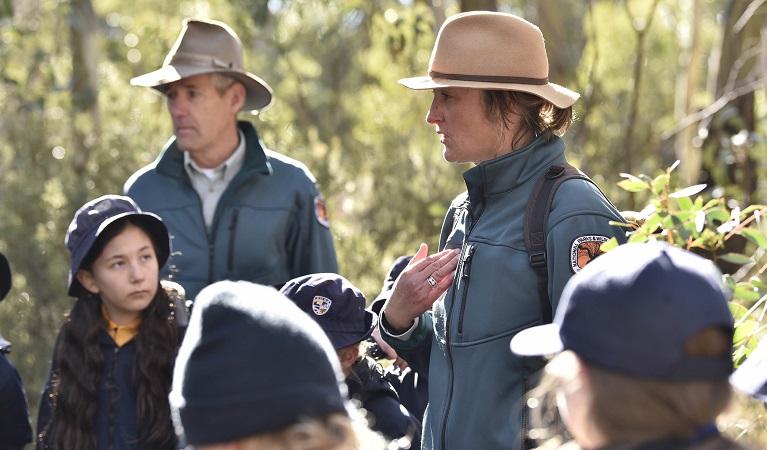 Two NSW National Parks educators lead primary school students on an excursion in Kosciuszko National Park. Photo: Adam Hollingworth &copy DPIE