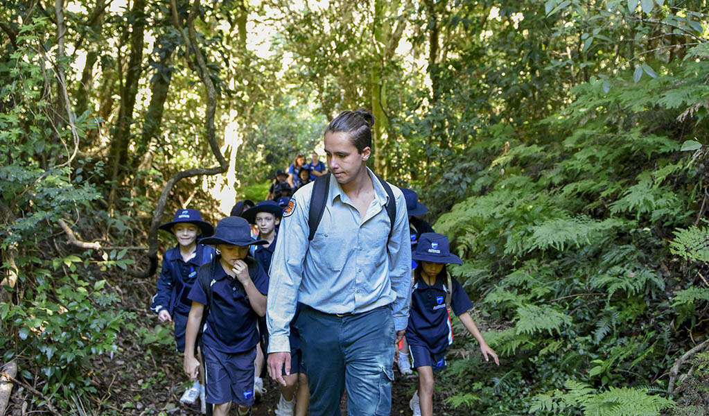 A group of students being lead on an excursion in a NSW National Park. Photo: Adam Hollingworth &copy; DPE