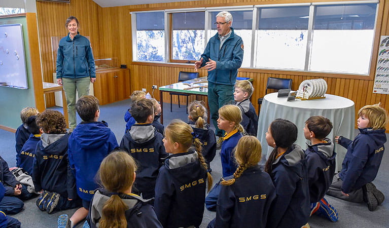 A group of students listening to an NPWS guide on a Caring for our special places school incursion. Photo: Adam Hollingworth, Hired Gun Photography &copy; DPIE