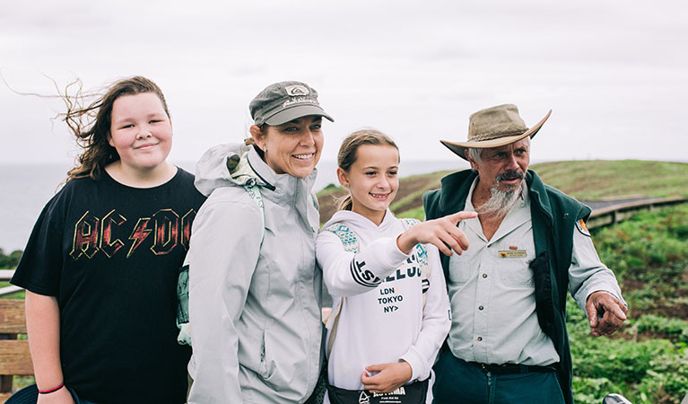 Students with their teacher and an NPWS guide on The rookery roundabout school excursion in Muttonbird Island Nature Reserve. Photo: And the Trees Photography &copy; DPIE