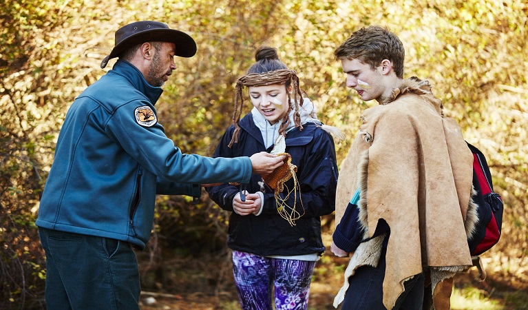 Aboriginal guide with 2 international students. Photo: Tanja Bruckner/OEH