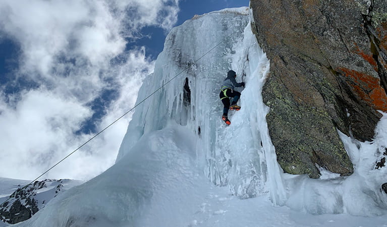 A roped climber ascends a curtain of ice in Kosciuszko National Park. Photo credit: Allie Pepper &copy; Allie Pepper Adventures