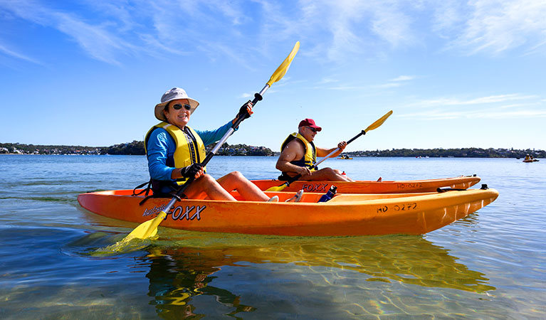 2 people kayaking on a Bundeena Kayaks guided tour. Photo: Paul Robbins &copy; Monde Photo