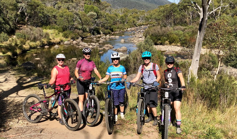 Five mountain bikers in Kosciuszko National Park on a Dirt Skills and Frills women's mountain bike retreat. Photo: L. Gunther/Dirt Skills and Frills