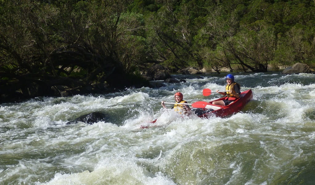 Kids canoe down whitewater rapids on an Exodus Adventures tour. Photo: Dingo Camps &copy; Exodus Adventures