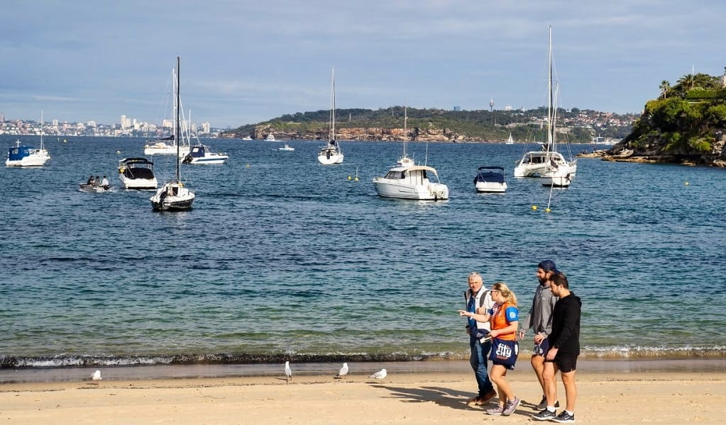 A Fit City Tours group walking along the shoreline during the Manly hiking tour. Photo &copy; Fit City Tours