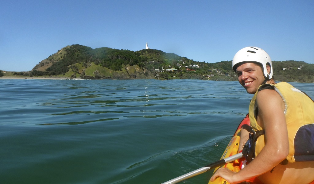 A person enjoying a unique view of the iconic Cape Byron Lighthouse with Go Sea Kayak Byron Bay. Photo: Kurt Tutt &copy; Go Sea Kayak Byron Bay