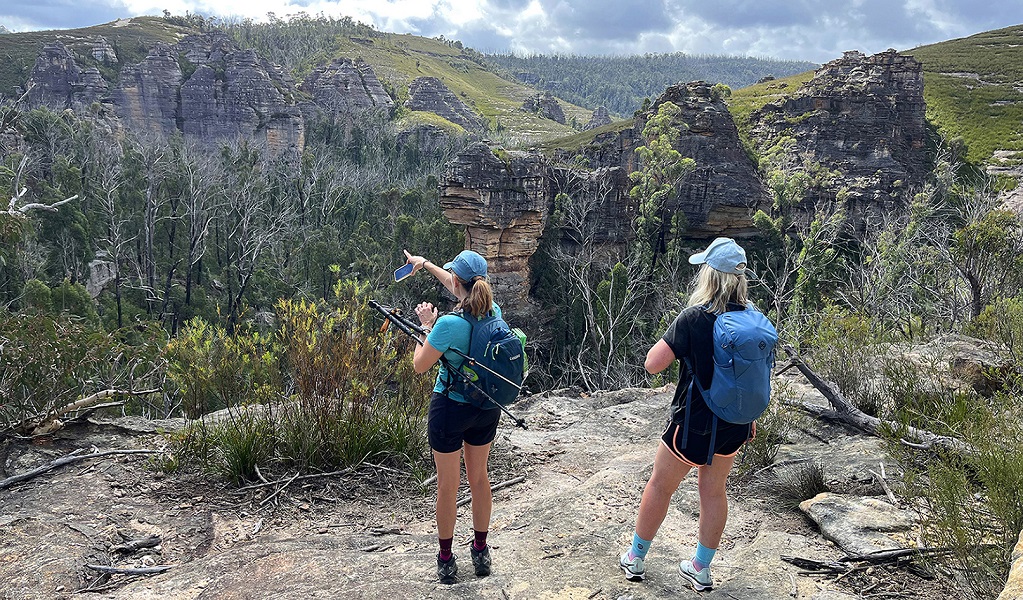 Hikers enjoying captivating views out over the Lost City near Lithgow. Photo &copy; Seek Sista