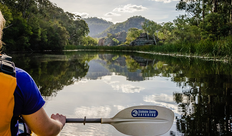 A paddler crosses Ganguddy-Dunns Swamp at daybreak. Photo &copy; Southern Cross Kayaking