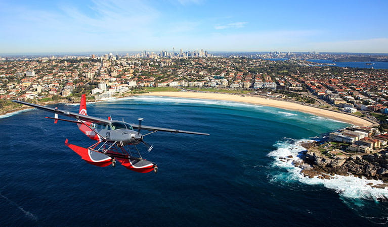 A Sydney Seaplanes plane flying over Bondi Beach. Photo: &copy; Sydney Seaplanes
